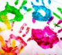 Kids fingerpainted handprints