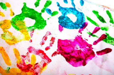 Kids fingerpainted handprints